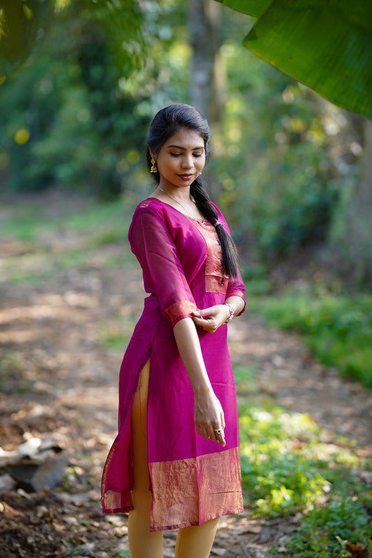 Dark pink kurti with shiny embroidery
