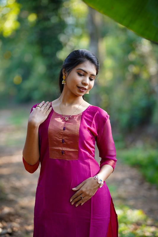 Dark pink kurti with shiny embroidery